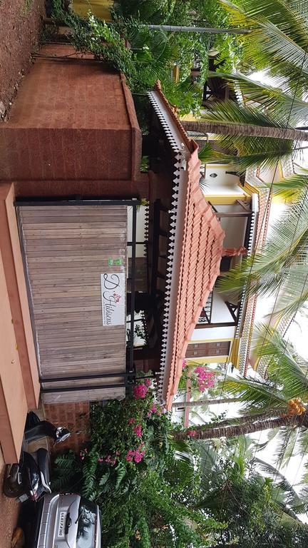 De Hibiscus Hotell Candolim Eksteriør bilde